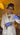 Person in a lab coat and gloves holding a syringe  and vial with stem cell  in Midtown NYC